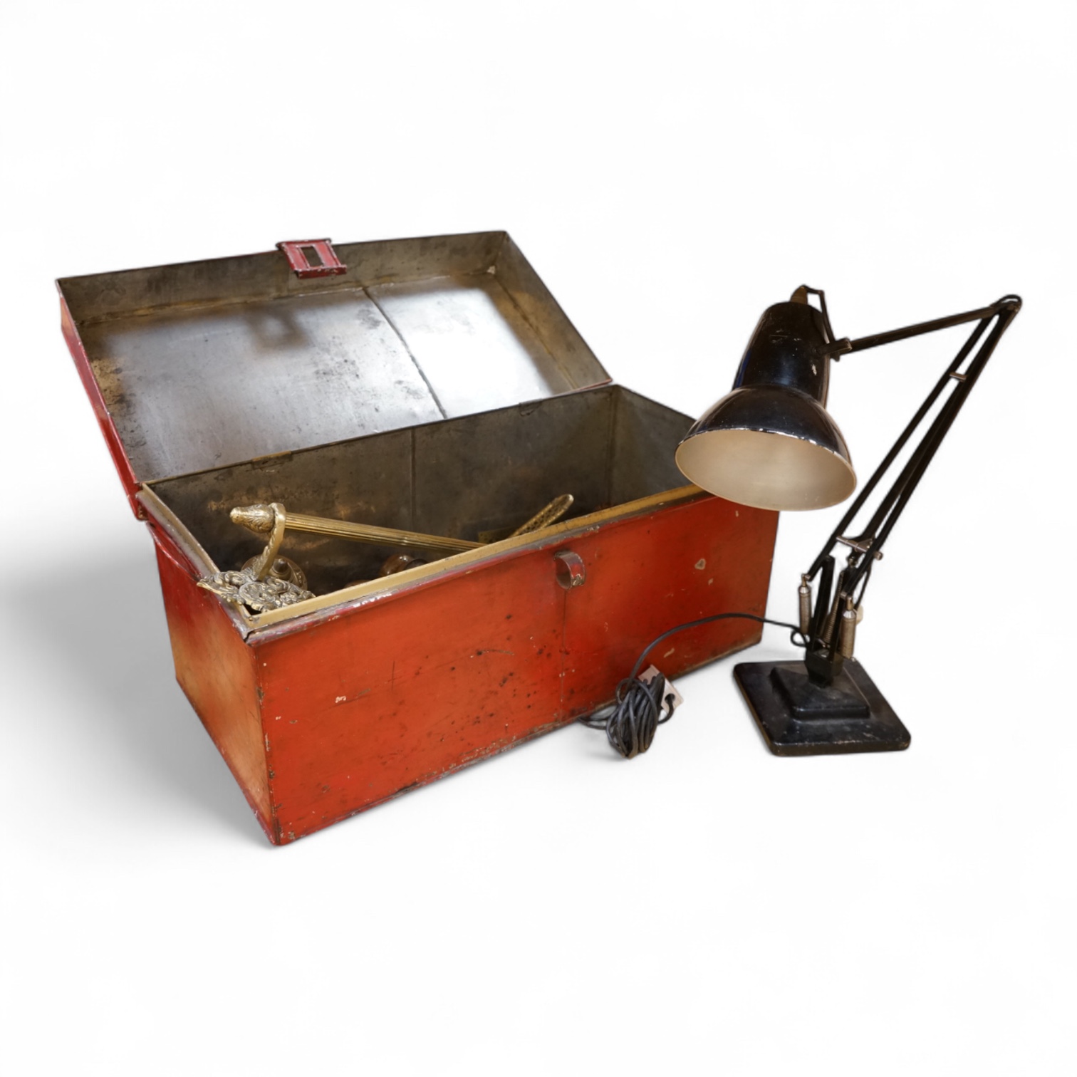 An Anglepoise lamp and metal door furniture and fittings in a tin trunk